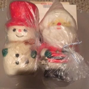 Vintage set of two pillar Christmas candles, Santa and Snowman